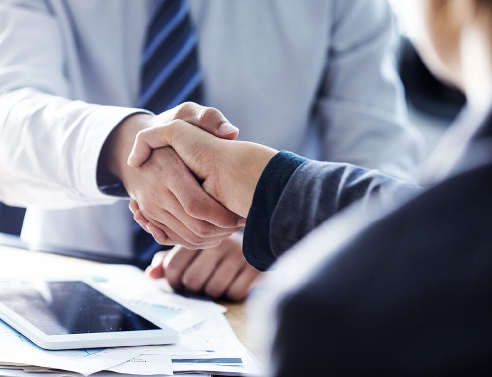 1Doctor and Broker Shake Hands 500x383@2x